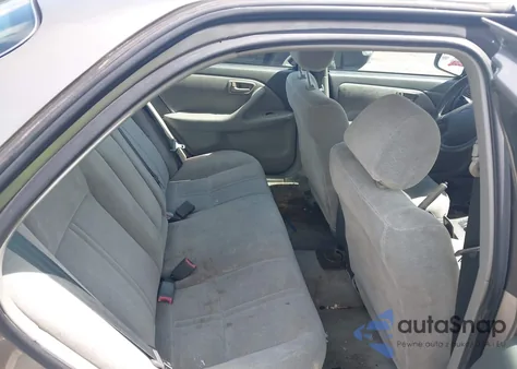 1999 Toyota Camry Le from USA, damaged, VIN 4T1BG22K1XU582834